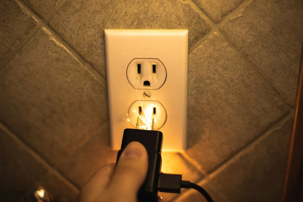 Buzzing Plug Socket: Call an Electrician