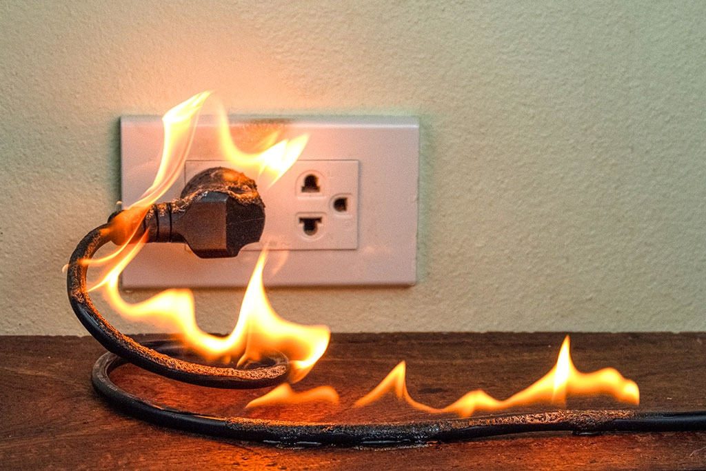 a buzzing plug socket dangerous